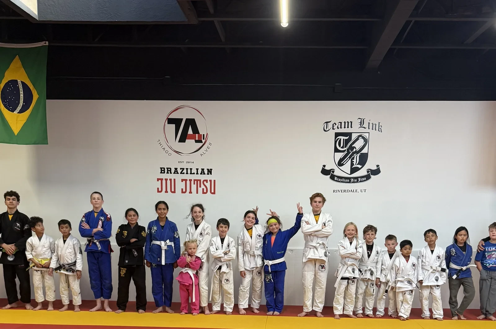 Kids learning sportsmanship through martial arts